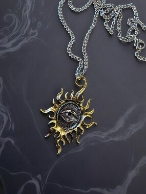 Metal Alloy and Stainless Steel All Seeing Eye with Artistic Sun Pendant